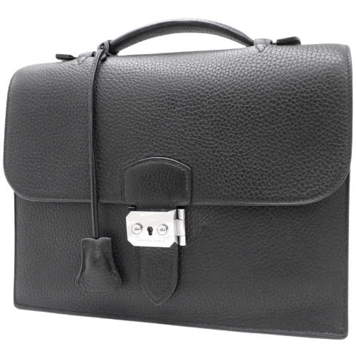 Sac a Depeche 27 Taurillon Clemence 皮革，配以钯和银质五金配件，刻有公文包和手提包的“I”。