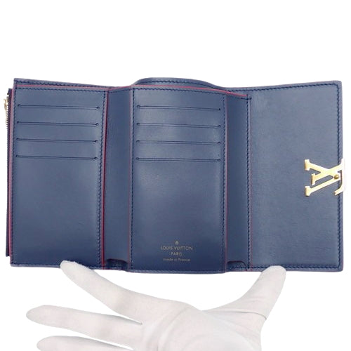 Portefeuille Capucines Compact Tri-fold Taurillon Leather Marine Rouge M63741