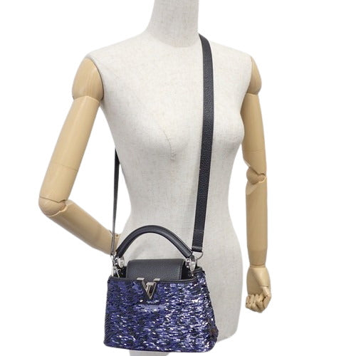 Capucines MINI 亮片 Taurillon 皮革包 M41805