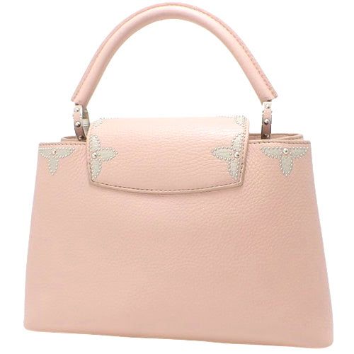 Capucines PM Taurillon 皮革铆钉单肩包 M51787