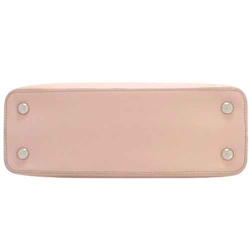 Capucines PM Taurillon 皮革铆钉单肩包 M51787