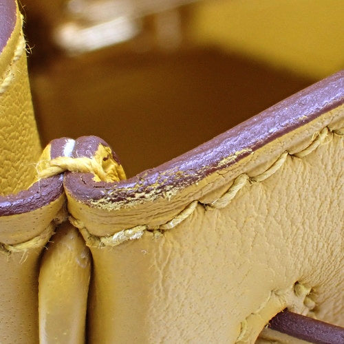 Kelly 25 (inner-stitched) Swift calfskin, Jeune Ambre color, gold hardware, Z stamp.