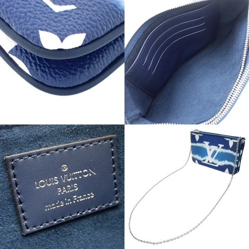LV Escale Pochette 双拉链链条手拿包，采用 Monogram Giant 帆布制成，M69124