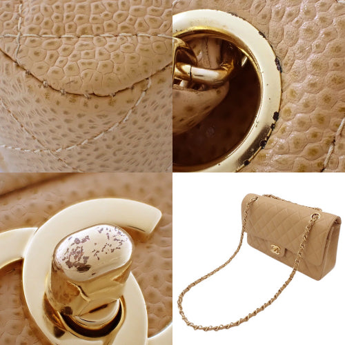 Matelasse Coco Mark Double Flap Chain Shoulder Bag in Caviar Skin