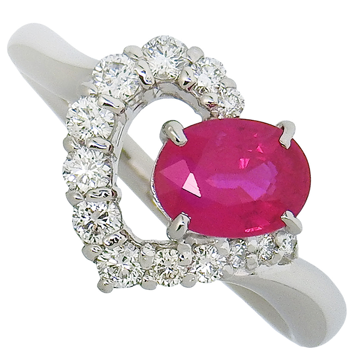Ruby and Diamond Ring: 1.22 carats of rubies, 0.35 carats of diamonds, 900 platinum.