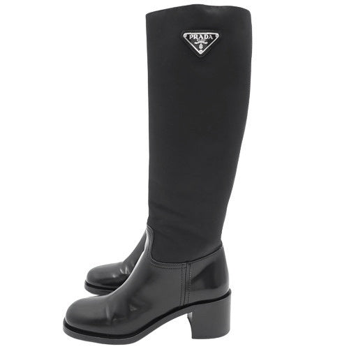 Long boots, size 36 1/2, zipper, triangle logo