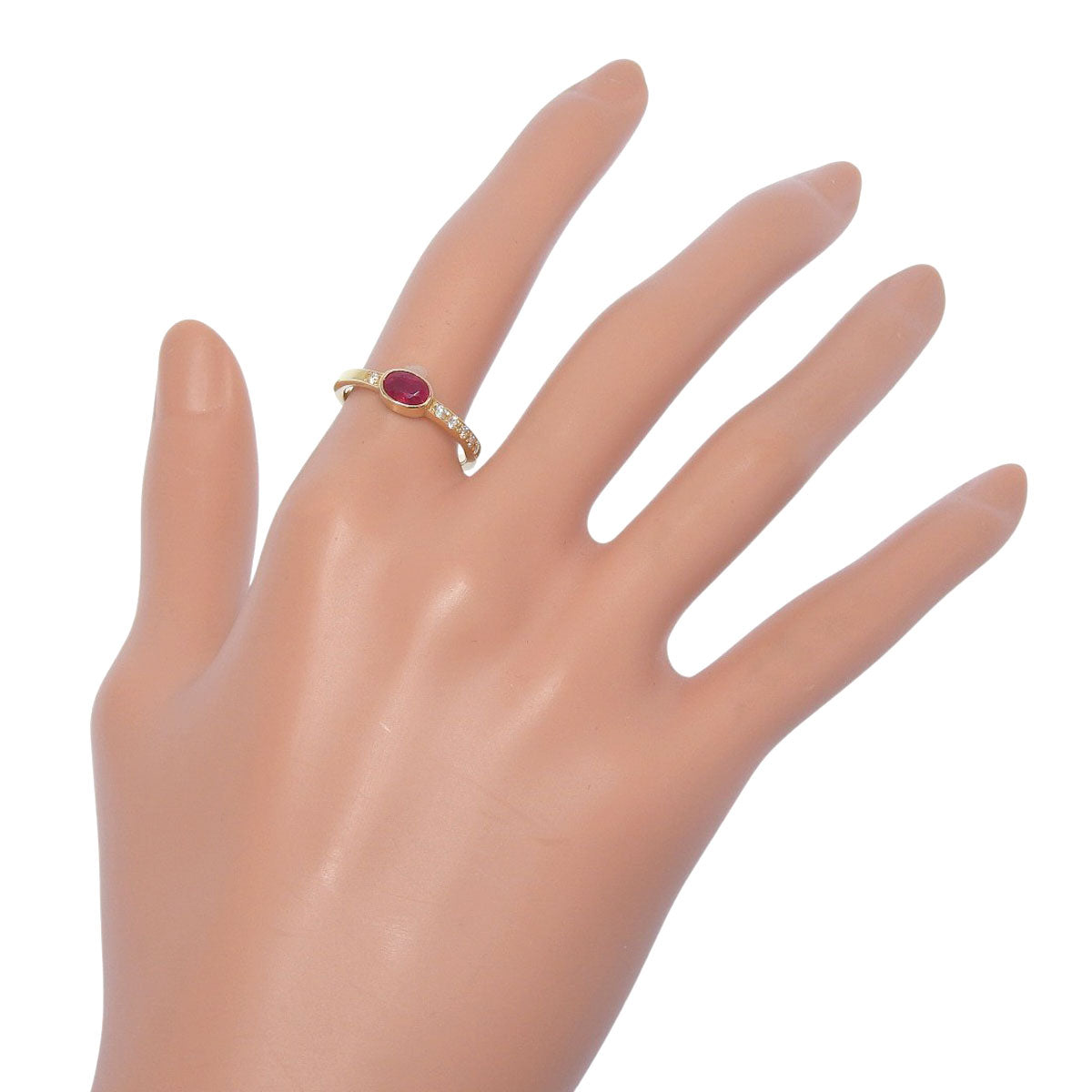 Ruby and Diamond Ring: 0.78 carats of rubies, 0.13 carats of diamonds, 18k yellow gold.