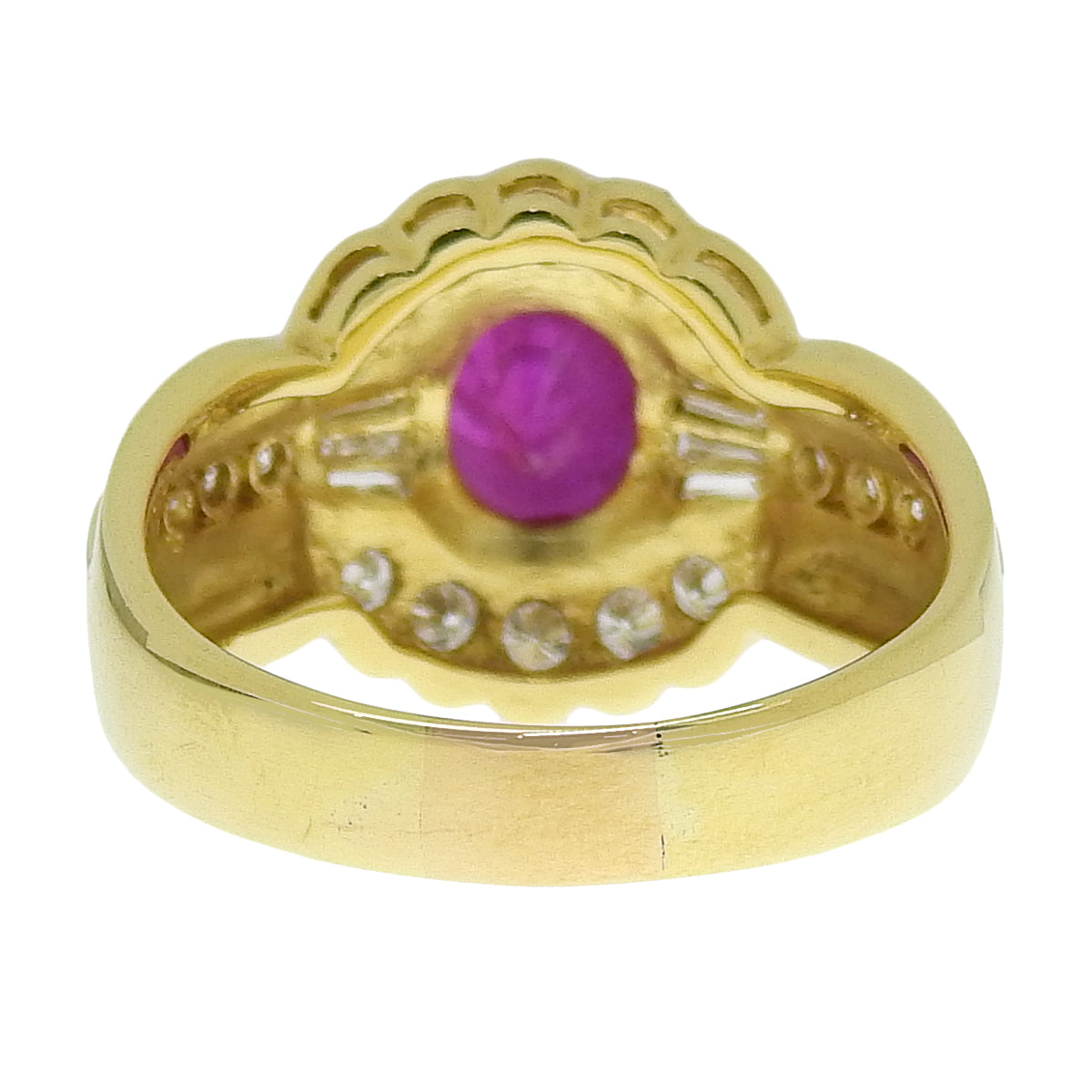 Ruby and Diamond Ring: 1.35 carats of rubies, 0.64 carats of diamonds, 18k yellow gold.