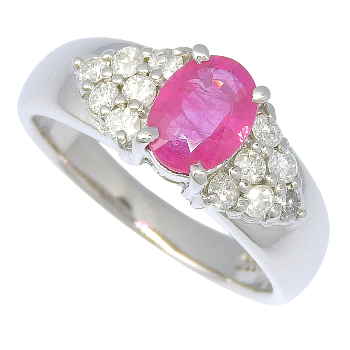 Pink sapphire and diamond ring in platinum (Pt900)