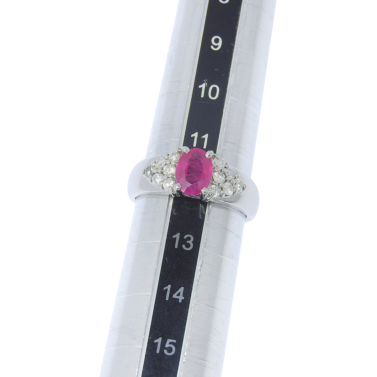 Pink sapphire and diamond ring in platinum (Pt900)