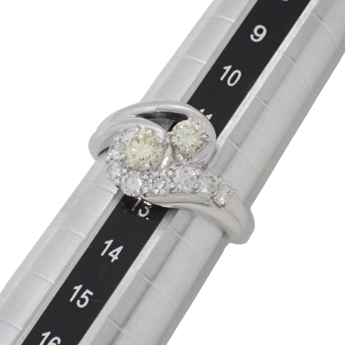 黄钻铂金交织戒指，主钻0.53克拉，辅钻0.47克拉，Pt900材质，指圈12号（欧码52），重8.5克。