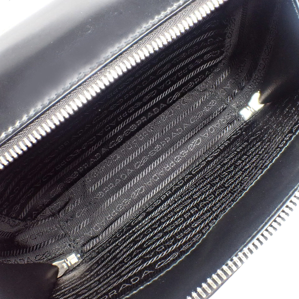 ブリック トライアングルロゴバッグ レザー NERO ネロ 2VH069