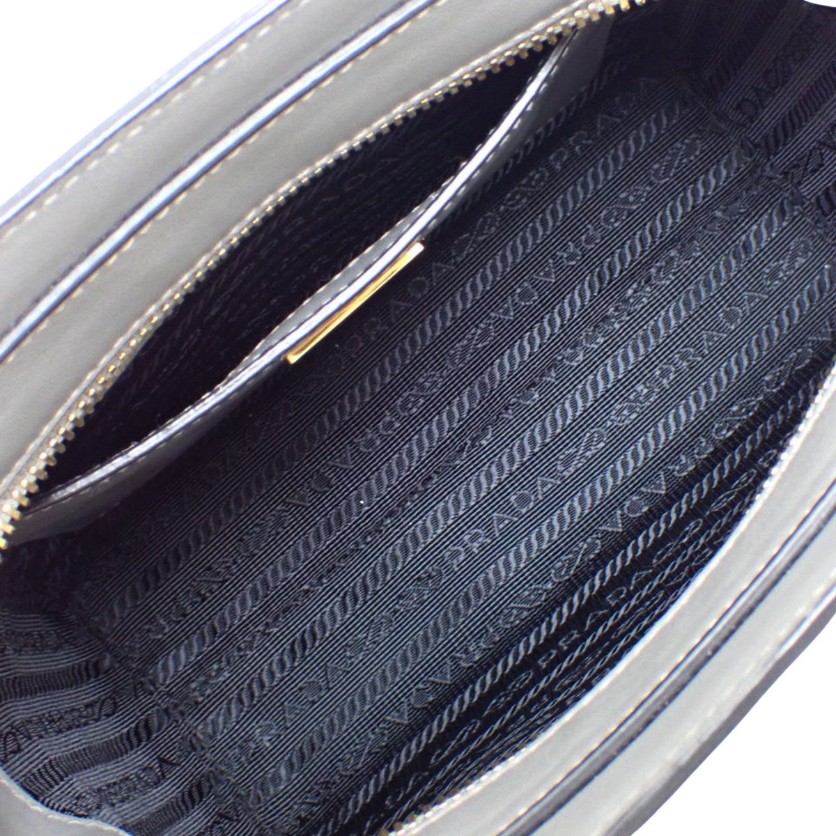 Mini bag in grey Saffiano leather 1BA380