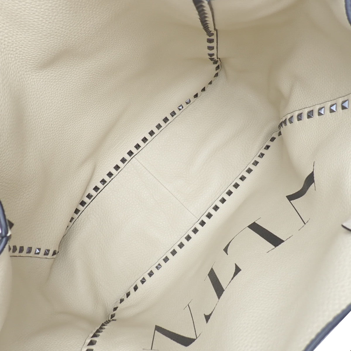 黑色和米色皮革双面大号手提包