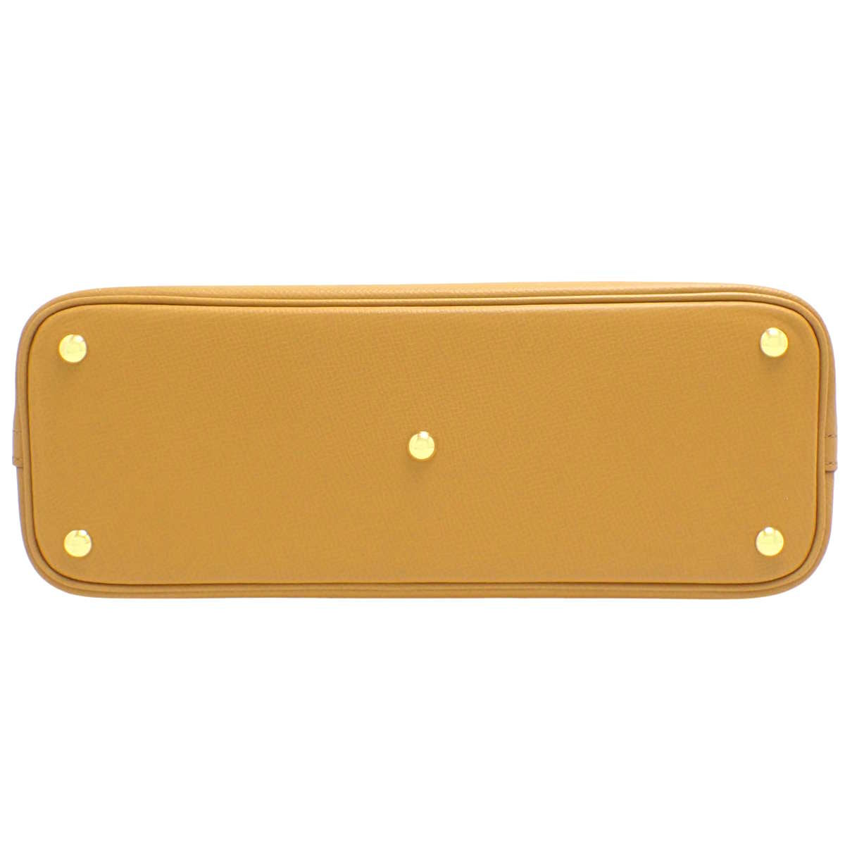 Bolide 27 爱普生芝麻色皮革腕表，配金色五金件和 Z 字印记