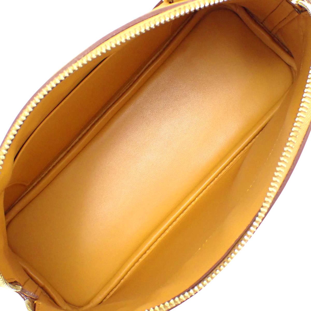 Bolide 27 爱普生芝麻色皮革腕表，配金色五金件和 Z 字印记