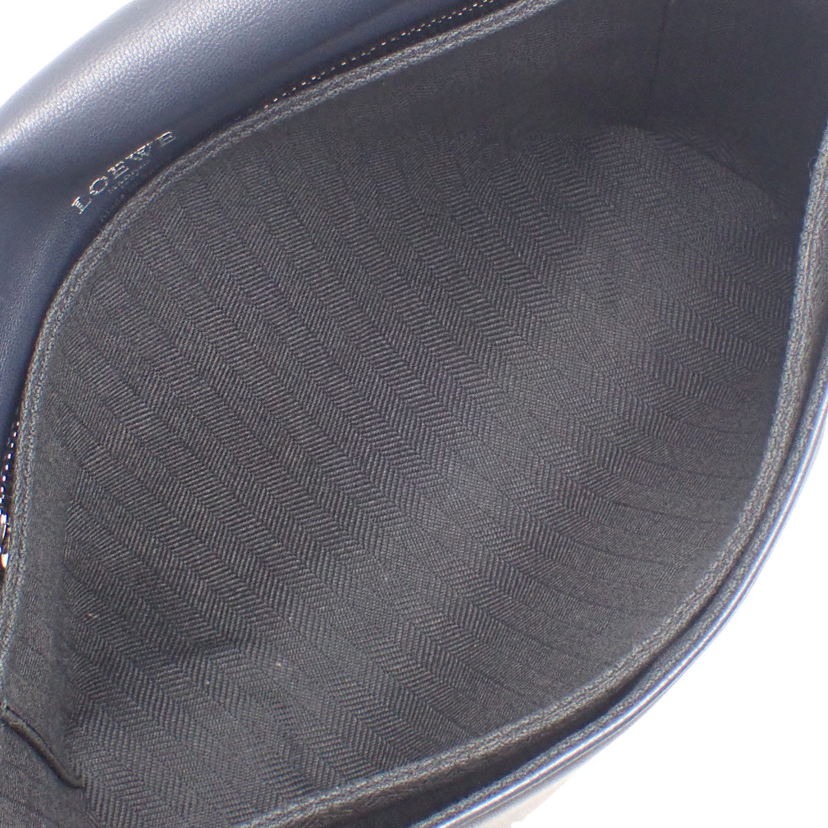 Anagram one-shoulder bag in navy sheepskin