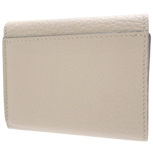 Portefeuille Capucines XS Tri-fold Wallet in Taurillon Leather, Galle M68747 (current product as of May 2024)